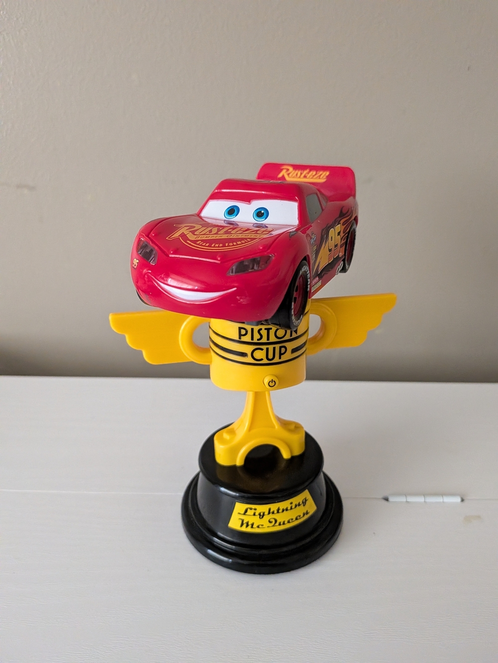 Disney Parks Cars Lightning McQueen Piston Cup Spinning Light & Sound Trophy
